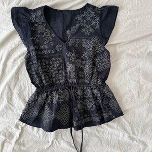Embroidered Black Peplum Top